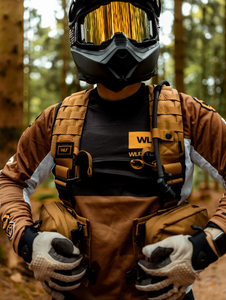 Rider buckling front straps of his Copper pack.