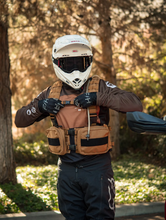 Load image into Gallery viewer, Rider adjusting top strap of the Copper Pack Vest